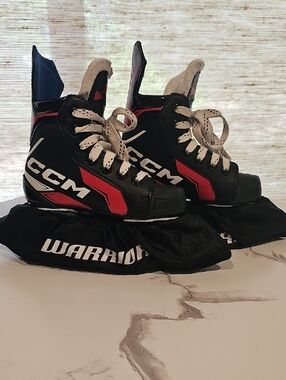 CCM Black and Red Junior Ice Hockey Skates Size 10/ Shoe Size 11